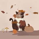 Chat joyeux sous les feuilles d'automne